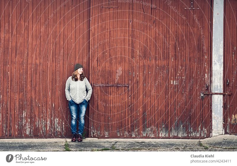 Lonely? No, dreamily enjoying the moment during the work break Barn door Barns Barn wall Woman's body jeans Dreamily dreaminess waiting be out Denim blue