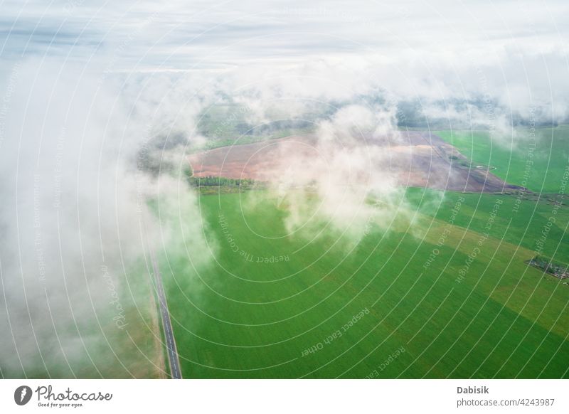 Aerial view of summer landscape with clouds over flight field aerial outdoor sky blue high fly atmosphere storm white cloudy space wind rainy above aerial view