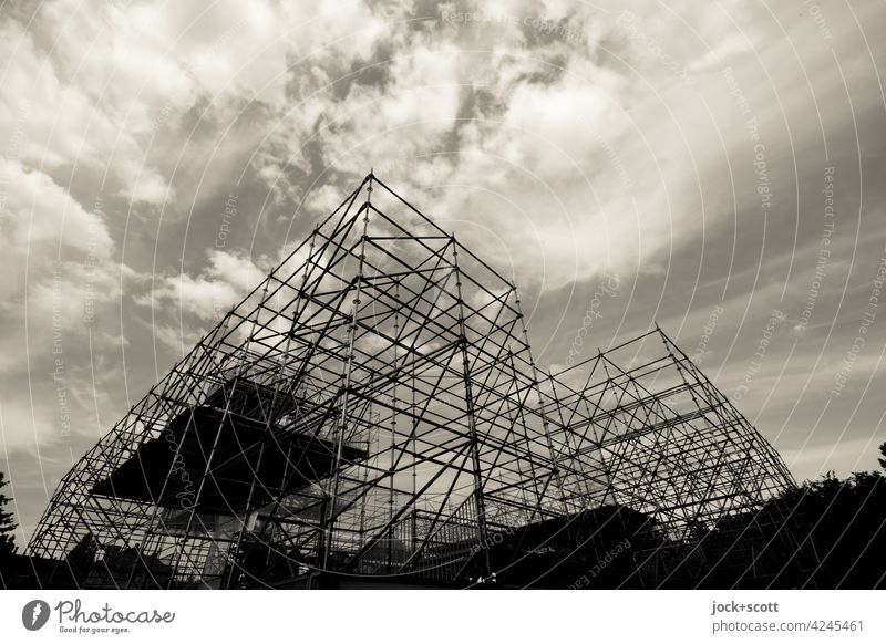 well equipped in black and white Scaffold Structures and shapes Installations Architecture Construction Scaffolding Complex Clouds in the sky Silhouette
