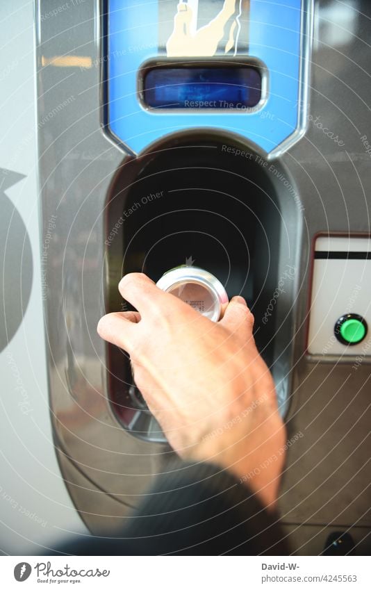 Can deposit from the hand into the deposit machine Deposit on cans tin Aluminium Recycling utilization Packaging Trash recycle Environmental protection Disposal