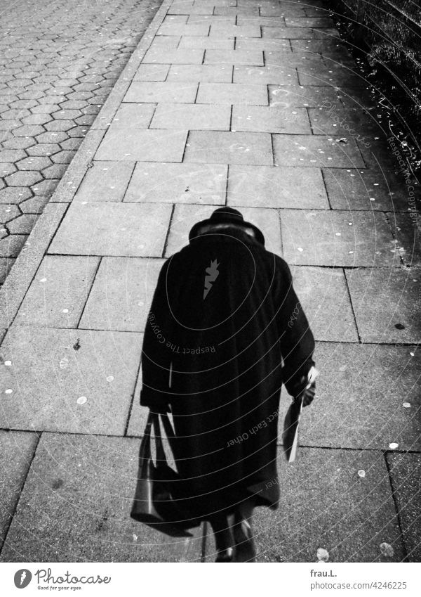 detour Grief Photomontage on one's own Human being Sadness sad Lonely Loneliness Crooked Coat Handbag Hat Going Woman Footpath