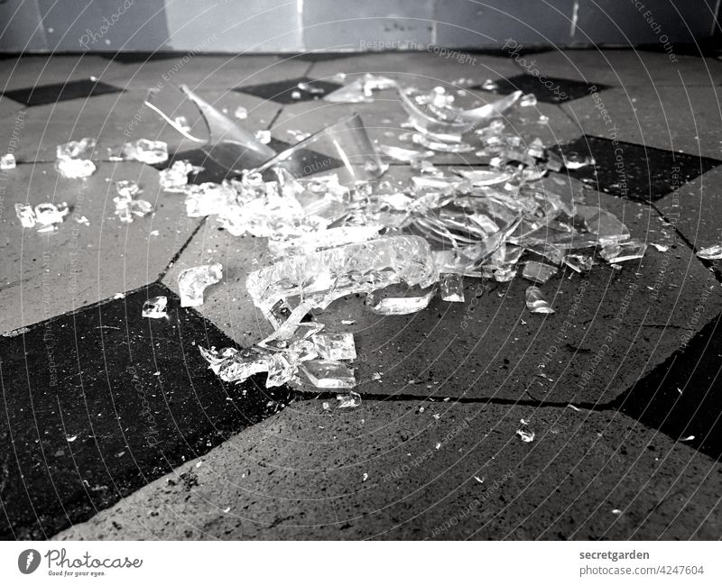 it's not gonna be like before. Broken Black & white photo Tile Ground Glass carelessly Clumsy fragmented individual parts shards irreparable Deserted