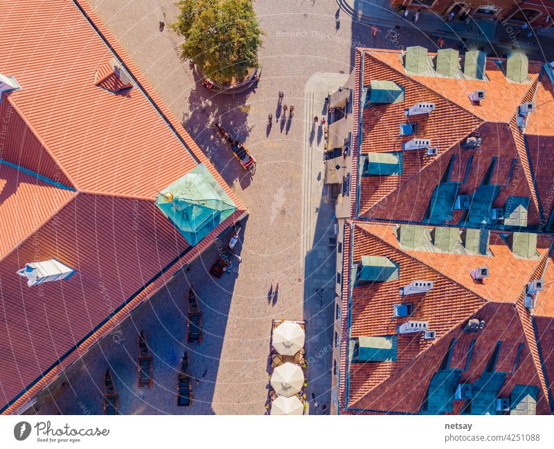 Aerial view of the red tiled roofs of the old town of Warsaw, Poland architectural architecture ballons blue building capital castel castle centre city