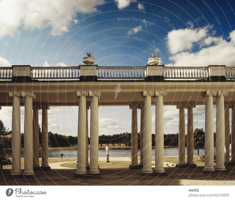 Under the columns Summer Column baroque castle Horizon Clouds Sky Forest Lakeside Exterior shot Sunlight Copy Space top Long shot Structures and shapes