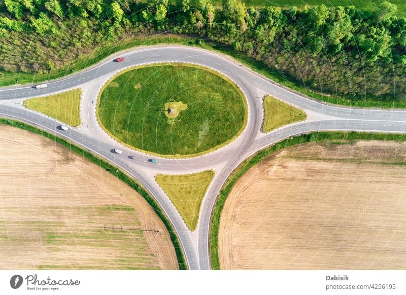 Aerial view of circle crossroad aerial traffic circulation highway round landscape top architecture asphalt car city drive infrastructure motorway path ring