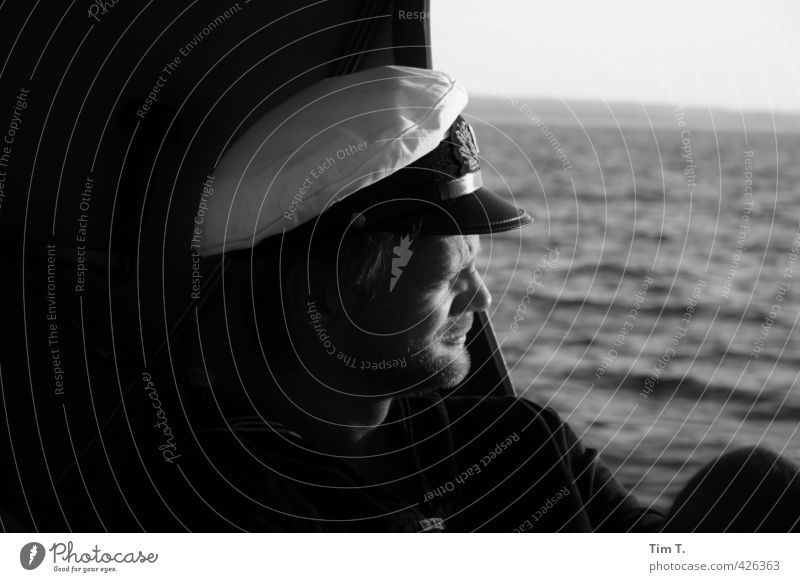 at sea Adventure Far-off places Freedom Ocean Human being Masculine Man Adults Head 1 30 - 45 years Captain Black & white photo Exterior shot Day Sunlight