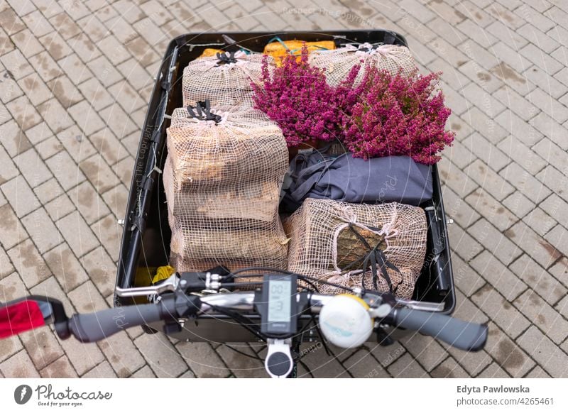 Shopping in a cargo bike shopping carrying tricycle day healthy lifestyle active outdoors joy bicycle biking activity cyclist enjoying bike ride modern