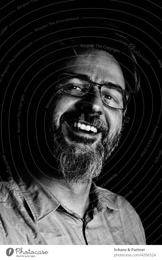 laughing man in black and white Facial hair Man Laughter Teeth Dark Face portrait Black & white photo Human being Head Eyes Masculine Nose Mouth Shadow