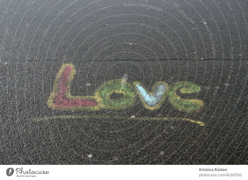 love - painted on the asphalt Love In love sensation Street painting Asphalt off Ground Painted Chalk variegated Declaration of love Affection relation