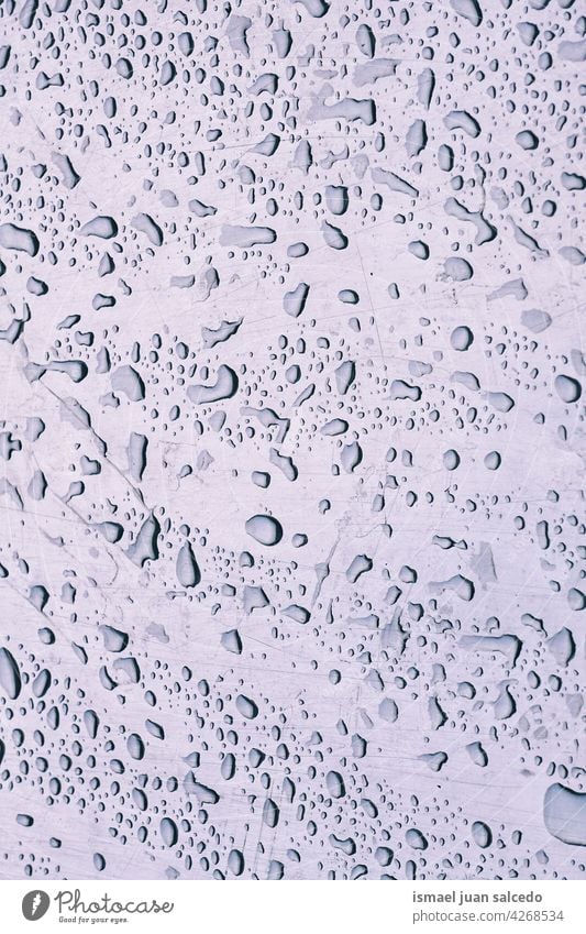 raindrops on the metallic surface abstract background rainy water wet floor aqua pattern textured colors backgrounds gray grey Drops of water Bad weather