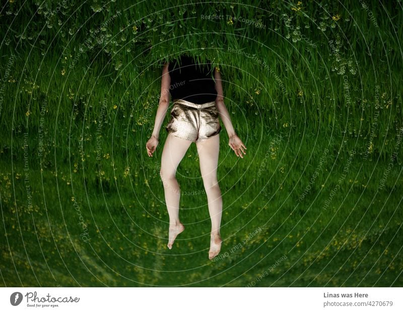 So apparently this image is upside down and the girl with her long legs staring from endless green fields seems to be headless. Wild summer adventures with long-legged models and green grass. Odd situations that still represent real life.