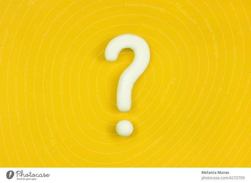 Question mark on orange background. Artificial model, mock-up of interrogation point. Question, doubt, asking concept. ? advising answer artificial