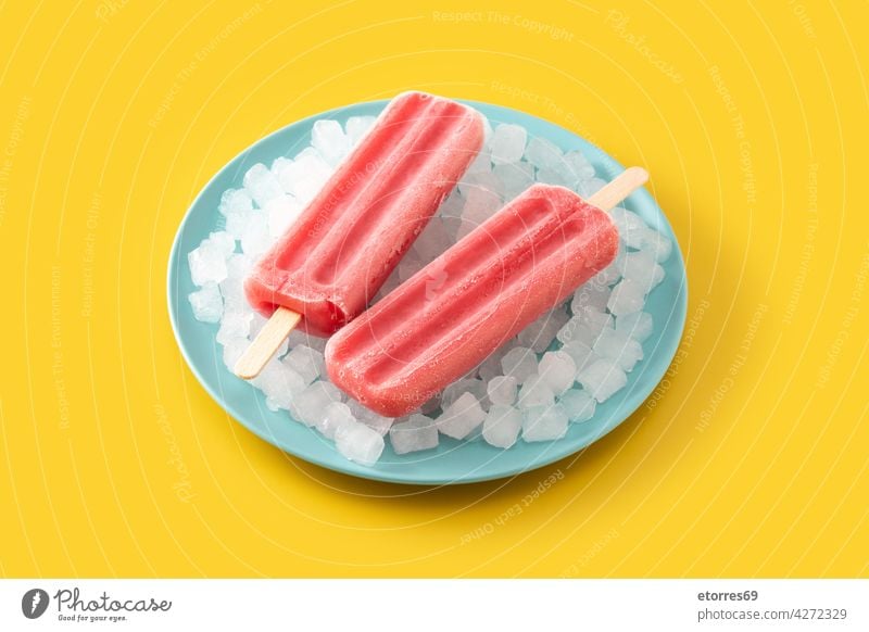 Strawberry popsicles with ice background blue cake cold colorful cool cream dessert flavor food fresh frosty frozen fruit homemade ice cream iced juice lolly