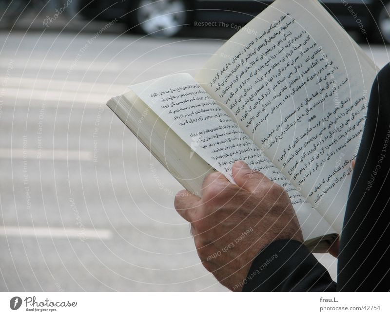 literature Poetic Smart Bus stop Book Man Hand Text Light Transport Reading Moral Persian literature days Street Life Sun Wait Car Arm