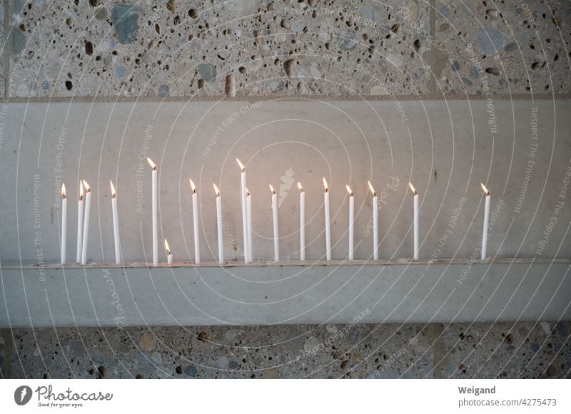 Candles for prayer in a church shoulder stand candles Advent Light Bright Hope Grief mourn Prayer Church Church service Belief Christianity Catholic Protestant
