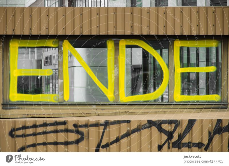 Here is definitely END Characters Spray Graffiti Street art Daub Capital letter Word End Stop (public transport) Tram metal cladding Window Landsberg Avenue