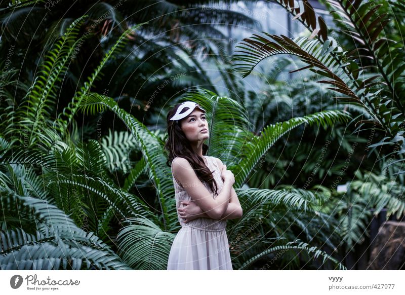 jungle drum Feminine Girl Young woman Youth (Young adults) 1 Human being 18 - 30 years Adults Nature Plant Bushes Virgin forest Dress Mask Observe Looking Stand