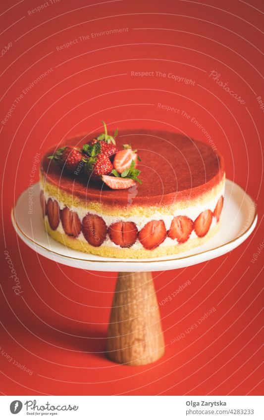 French strawberry cake Fraisier. french cake stand red background mint sponge cake plate sweet food pastry dessert bakery fruit cream fresh tasty white summer
