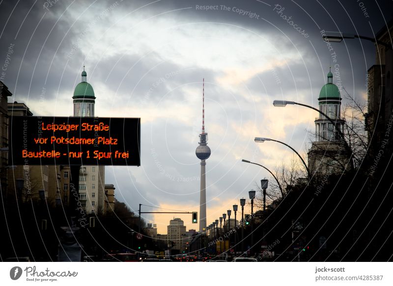 Traffic information at the Frankfurter Tor Karl-Marx-Allee Berlin TV Tower Friedrichshain Sky Clouds Street Capital city Information Transport
