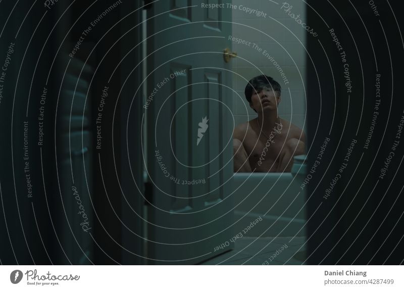 Guy Naked In The Bathroom With Smoke boy topless Dark darkness Contrast green background asian Man young Youth (Young adults) Adults Human being Hipster