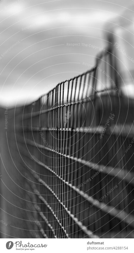 Fence in black white Grating Black & white photo Iron obstructed blurriness Focus on focus focused shallow depth of field black-and-white holes block Exclude