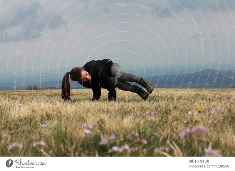 Yoga in the Rhön while hiking hoot Nature Nature reserve Meadow Meadow flower Flower Plant Yoga posture Spring Hiking Hiking boots Athletic Sportswear Horizon