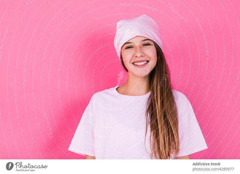 Charming teen in casual wear and headscarf smile woman cancer charming pleasant enjoy portrait adolescent girl sick chemotherapy millennial teenage glad