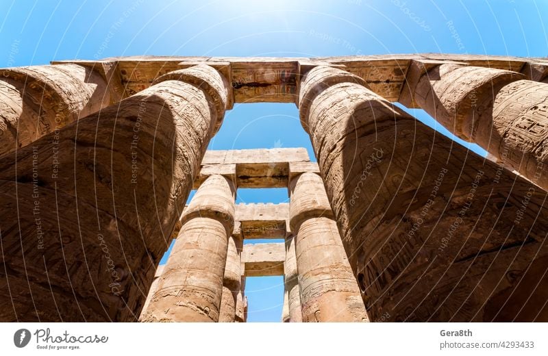 antique columns in a karnak temple in luxor Luxor ancient architecture blue building cairo civilization culture day egypt egyptian culture excursion famous