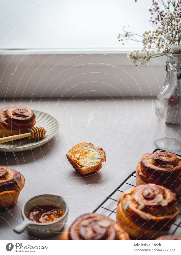 Fresh cinnamon buns on table morning fresh dessert food delicious half whole breakfast homemade organic yummy natural sweet meal appetizing tasty pastry