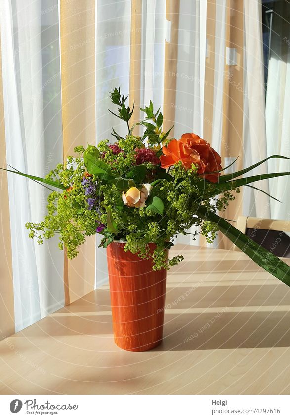pretty colorful bouquet of flowers from the garden stands on a table in the sickroom Bouquet Flower Blossom Vase Flower vase Ostrich Table Curtain Sunlight