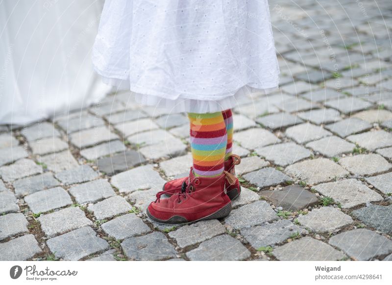 Child with rainbow pants variegated Girl celebration Rainbow miscellaneous Gender justice Elementary school kita colourful zest for life