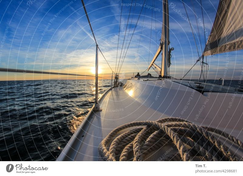 View over a ship deck into the sunset Sailing ship Water Ocean Sailboat Vacation & Travel Navigation Exterior shot Colour photo Boating trip Summer Freedom