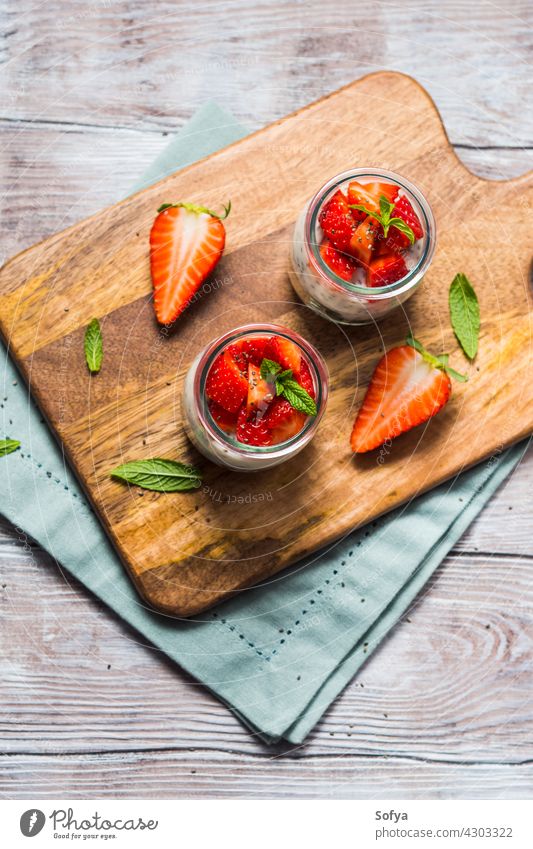 Yogurt and granola with strawberries. Breakfast strawberry breakfast dessert yogurt food fruit glass healthy sweet gourmet morning pudding vegan cereal