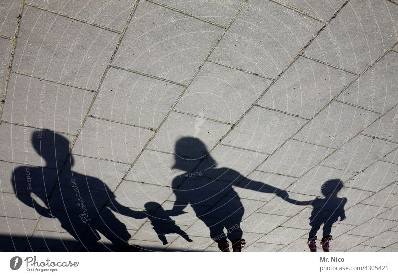 family happiness Family & Relations Shadow Related Trust Shadow play Together Family outing Domestic happiness Attachment Group Happy Father Mother Woman Adults
