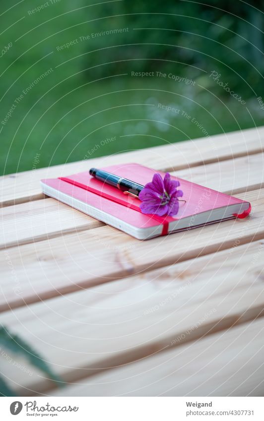 Notebook with flower Break Plan Garden Book notes pen Idea creatively Nature