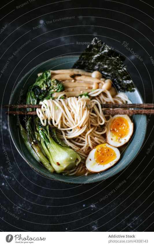 Bowl with yummy fresh ramen bowl dish tradition lunch chopstick tablecloth asian food cuisine delicious meal tasty gourmet japanese oriental dinner nutrition