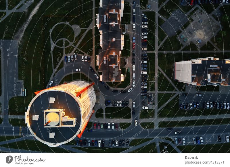 Aerial view of car parking lot near modern house building residential yard transport living sector parking space vehicle outdoor top asphalt street urban vacant