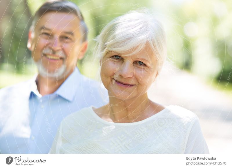 Senior Couple Outdoors senior seniors couple pensioner pensioners woman casual outdoors adult togetherness two people carefree day Caucasian happiness toothy
