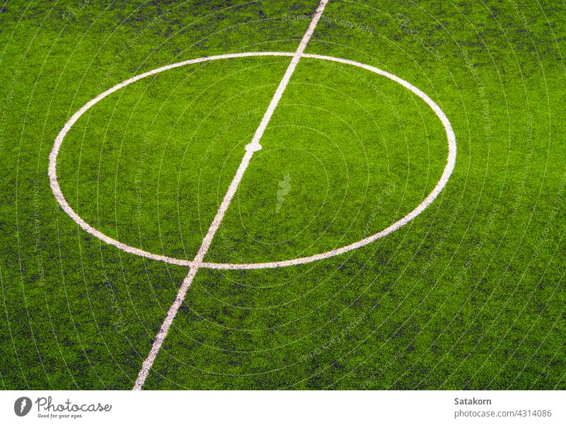 Texture of artificial grass in school football field leisure play lawn playground green outdoor recreation background line white summer activity