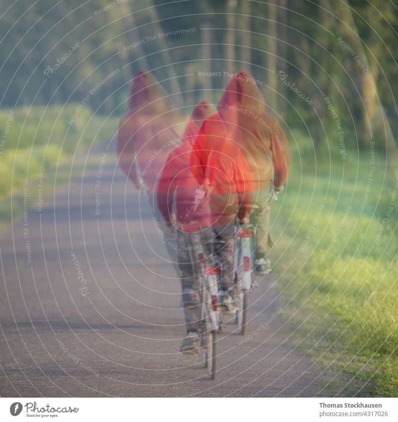 man on bicycle with red hoody, abstract picture dream asphalt ride bike nature outdoor person healthy outdoors