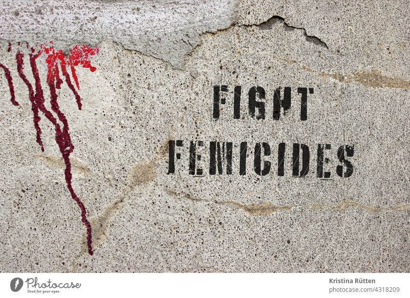 fight femicides graffiti on wall with red paint marks Combat femicides femicidal WOMAN'S MURDER murders of women misogyny Murder killing Force Against Misogyny