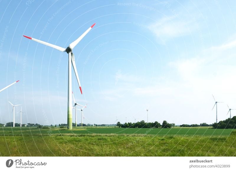 Wind turbines in the North German Plain Pinwheel wind farm wind power Wind energy plant Renewable energy Energy industry Electricity Environmental protection