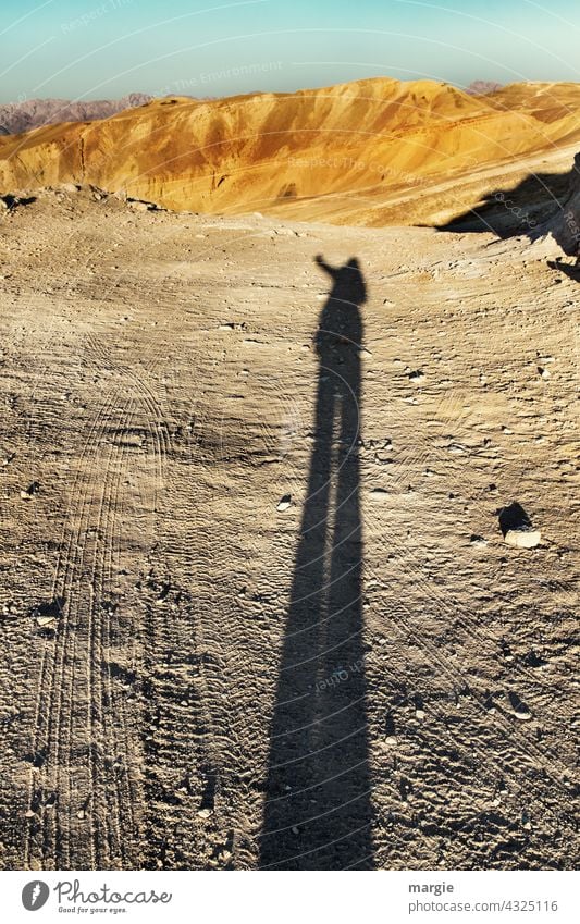 occupied | here I stand Shadow Exterior shot Desert Nature Landscape Vacation & Travel Skid marks Far-off places Stony mountains middle east Sand Adventure