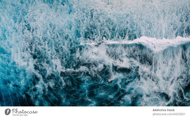 Abstract background of waving sea wave foam seascape ocean water turquoise abstract splash scenic nature marine summer picturesque surface weather environment
