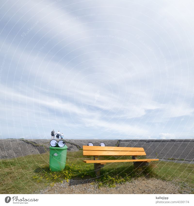 dike walk Dike eyes Comic rubbish bin Bench vacation Exterior shot Sky Green Calm Colour photo Relaxation Blue Deserted Meadow Clouds Grass North Sea Summer