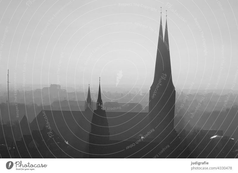 Lübeck Tower Spire Church Town Haze Gray Architecture Manmade structures Tourist Attraction Building Religion and faith Historic Old town Point