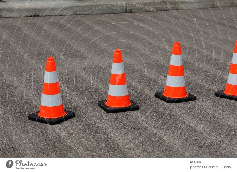 Traffic cones on the street secure the work traffic road safety sign construction symbol warning isolated plastic security stop icon barrier alert highway