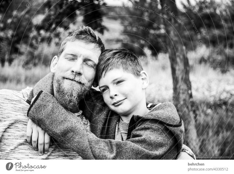 father with son. cuddling contentment. happy with love. Safety (feeling of) Happiness Laughter Trust Infancy Black & white photo Father Son Love Together Child
