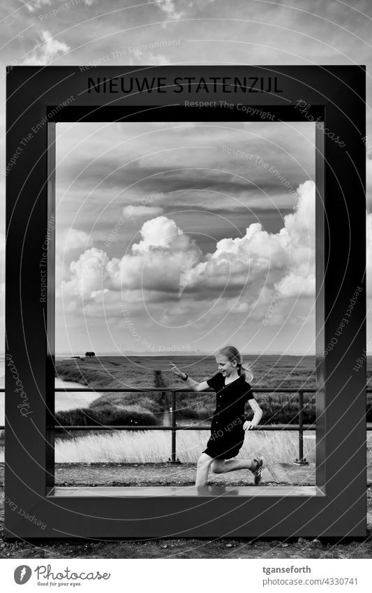 Nieuwe Statenzijl Frame Girl Running keel box reed dollar coast Netherlands Rheiderland Ems bunches steel frame Clouds Ocean Beach Exterior shot