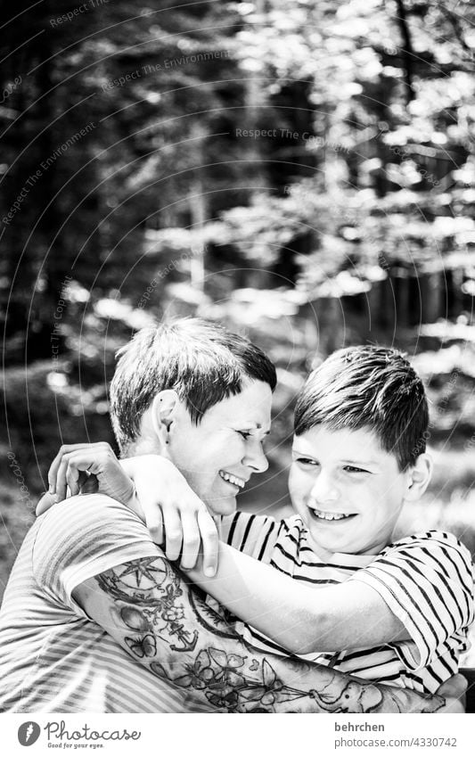 two who love each other Contrast Sunlight blurriness portrait Light Day Close-up Exterior shot Motherly love Happy Love Son Together Trust Contentment Happiness